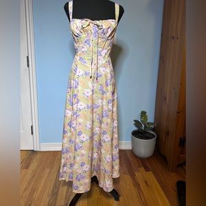 Floral midi dress with bohemian tie front and detailed bodice. Never worn